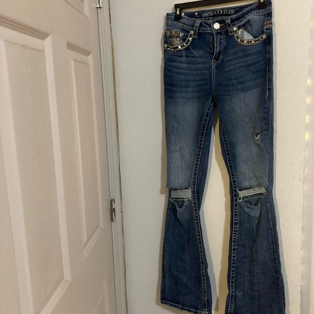 Edgy Blue Flare Jeans by [Brand]